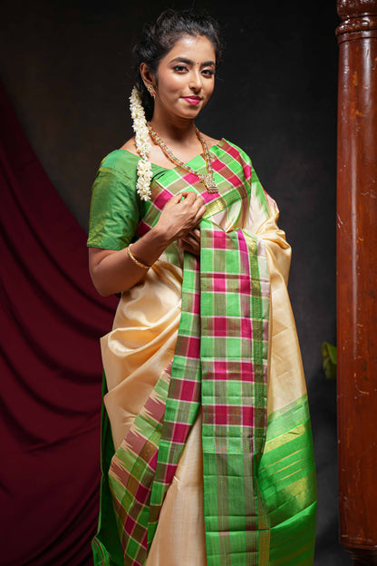 Sandal plain parambariya pattu saree with contrast checked ikkat style border and zari striped pallu