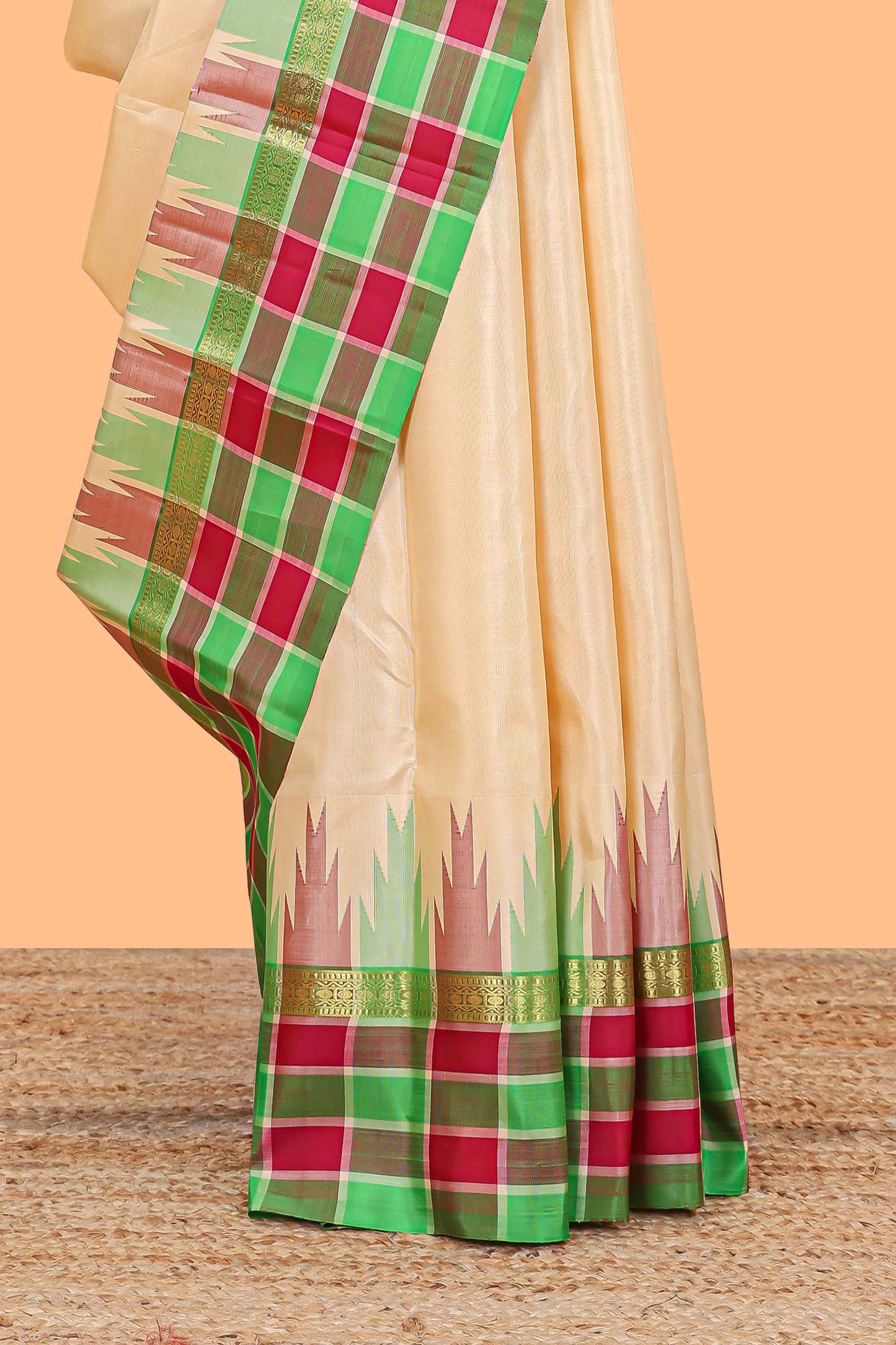 Sandal plain parambariya pattu saree with contrast checked ikkat style border and zari striped pallu