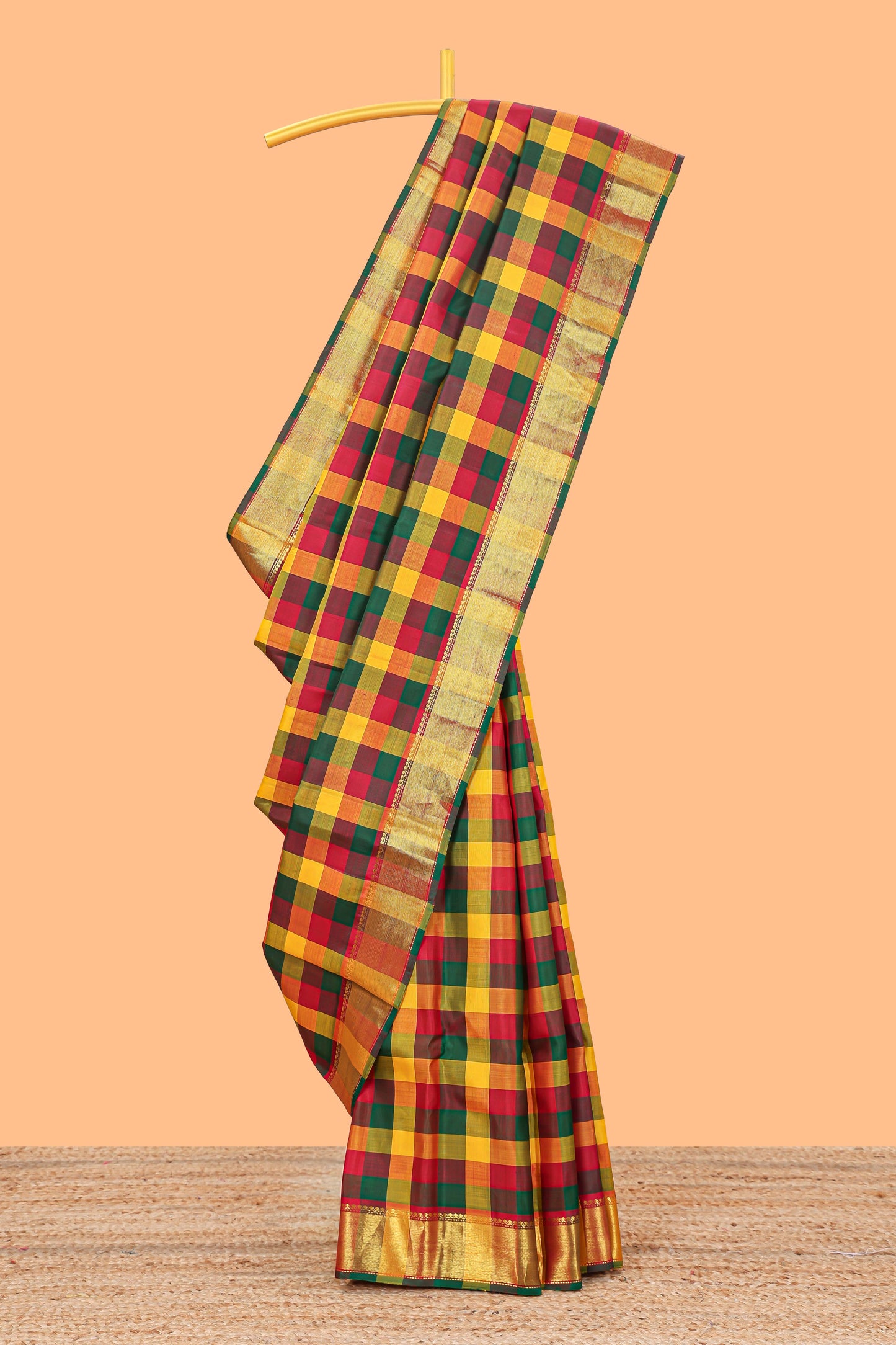 Multi color checked parambariya pattu saree with self zari border and contrast striped pallu