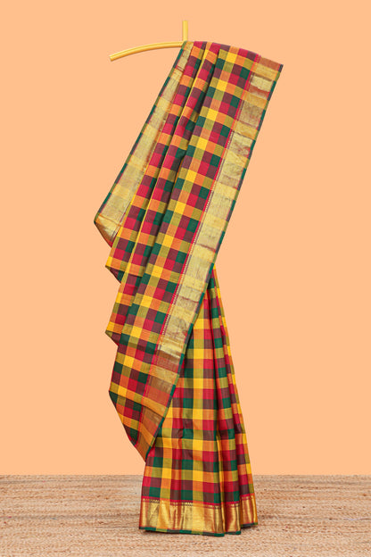 Multi color checked parambariya pattu saree with self zari border and contrast striped pallu