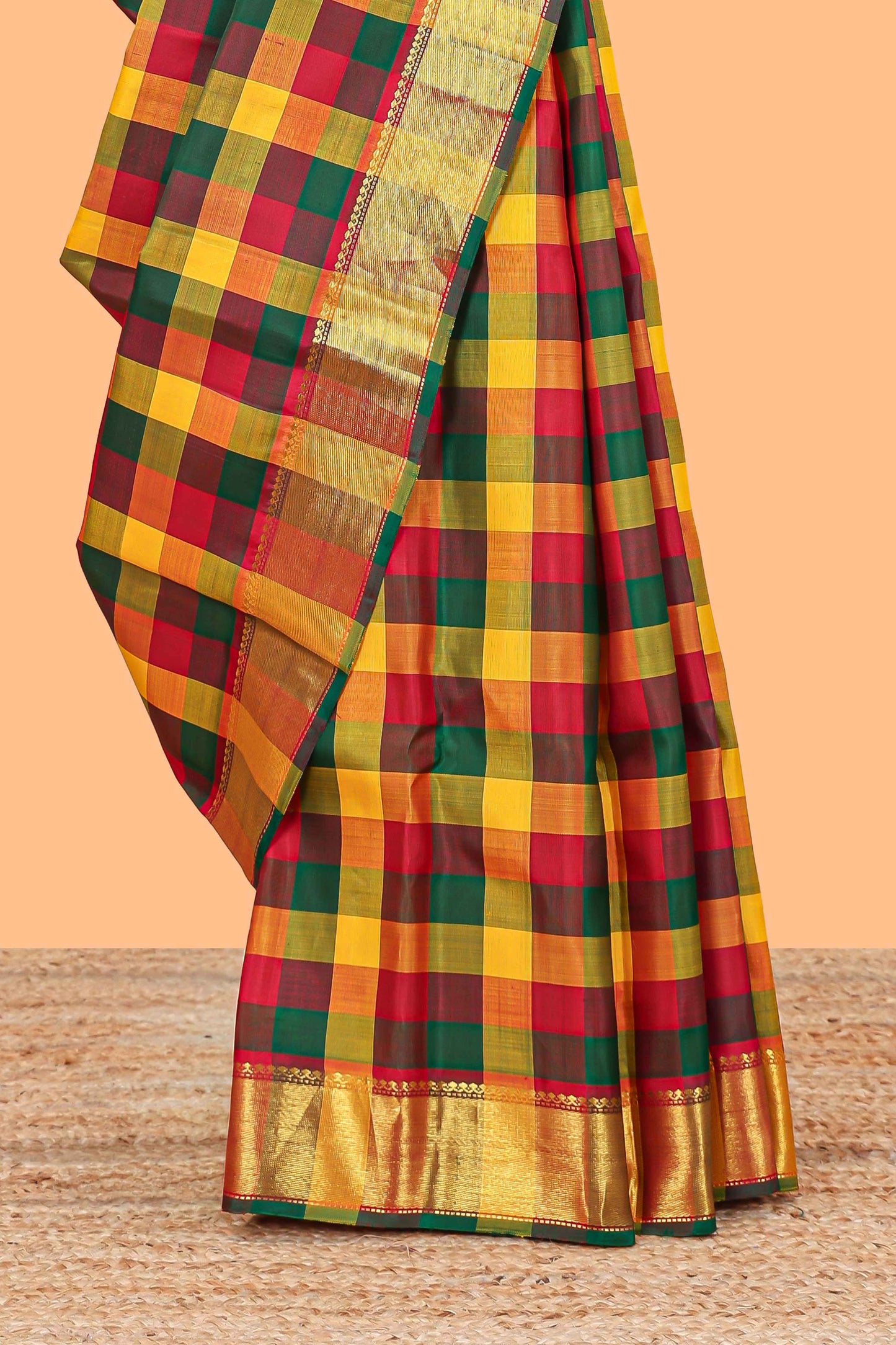 Multi color checked parambariya pattu saree with self zari border and contrast striped pallu