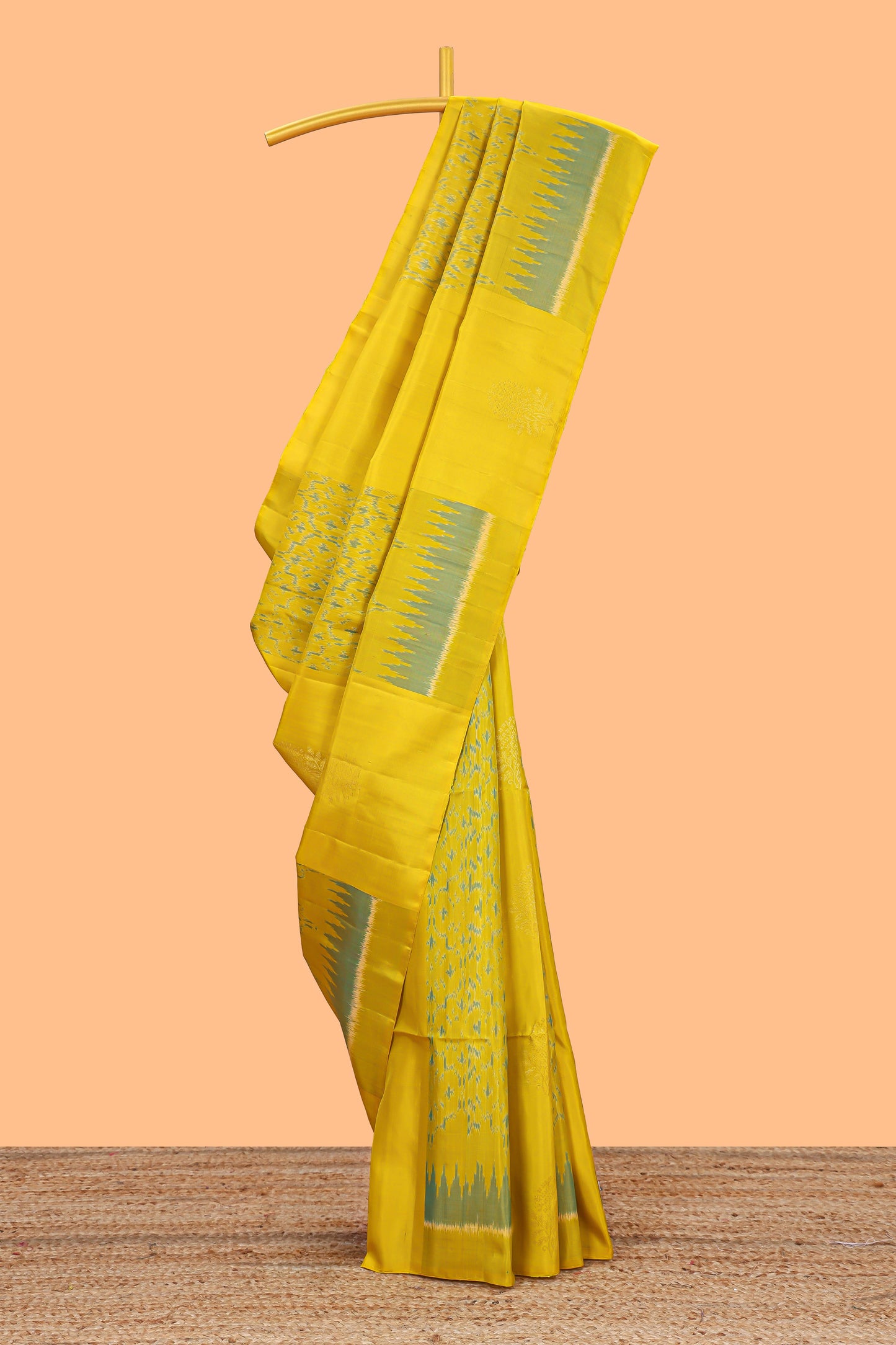 Lemon yellow parambariya pattu saree with self zari border and contrast blouse