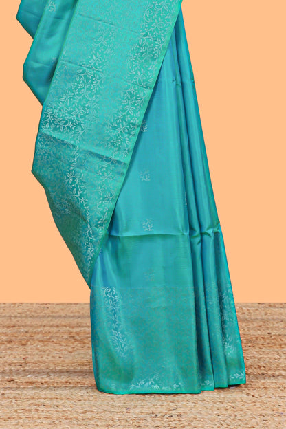 Borderless turquoise green zari stripes and butta parambariya pattu saree with self pallu and matching blouse