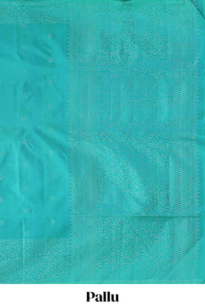 Borderless turquoise green zari stripes and butta parambariya pattu saree with self pallu and matching blouse
