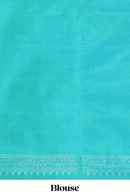 Borderless turquoise green zari stripes and butta parambariya pattu saree with self pallu and matching blouse