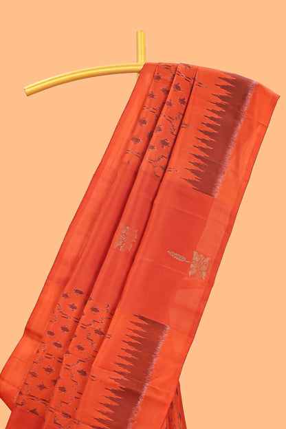 Orange ikkat style parambariya pattu saree with self border and contrast pallu