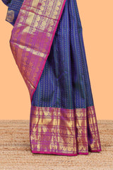 Blue zari butta dotted stripes parambariya pattu saree with contrast border and pallu