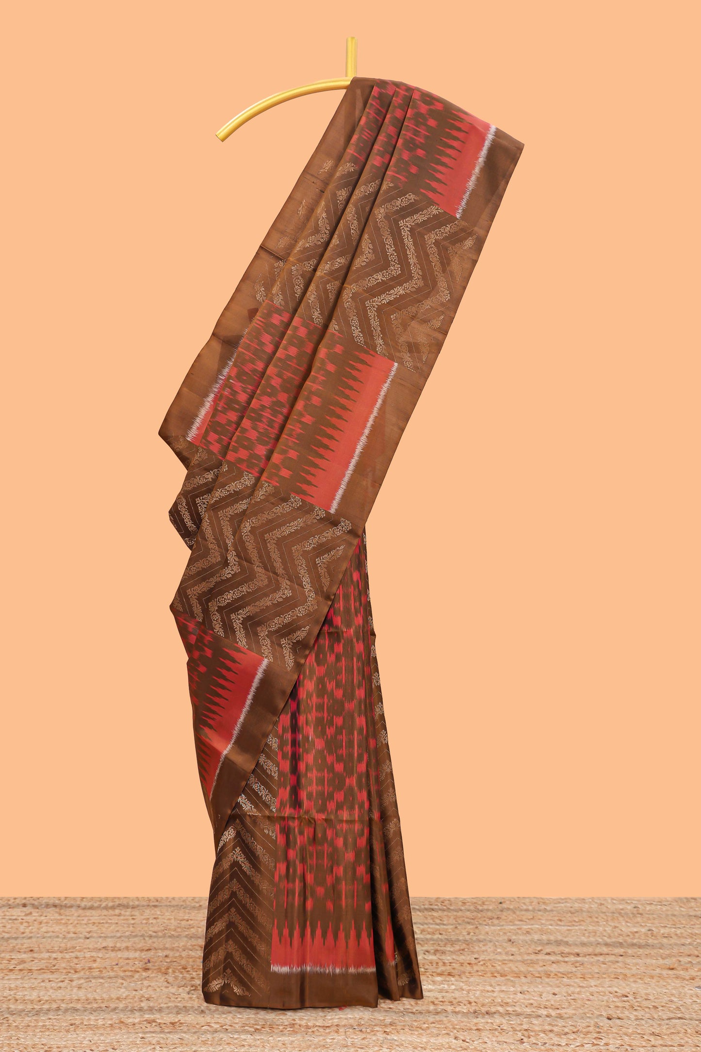 Borderless brown chevron and ikkat style parambariya pattu saree with contrast blouse and pallu