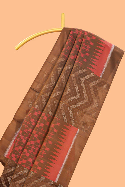 Borderless brown chevron and ikkat style parambariya pattu saree with contrast blouse and pallu