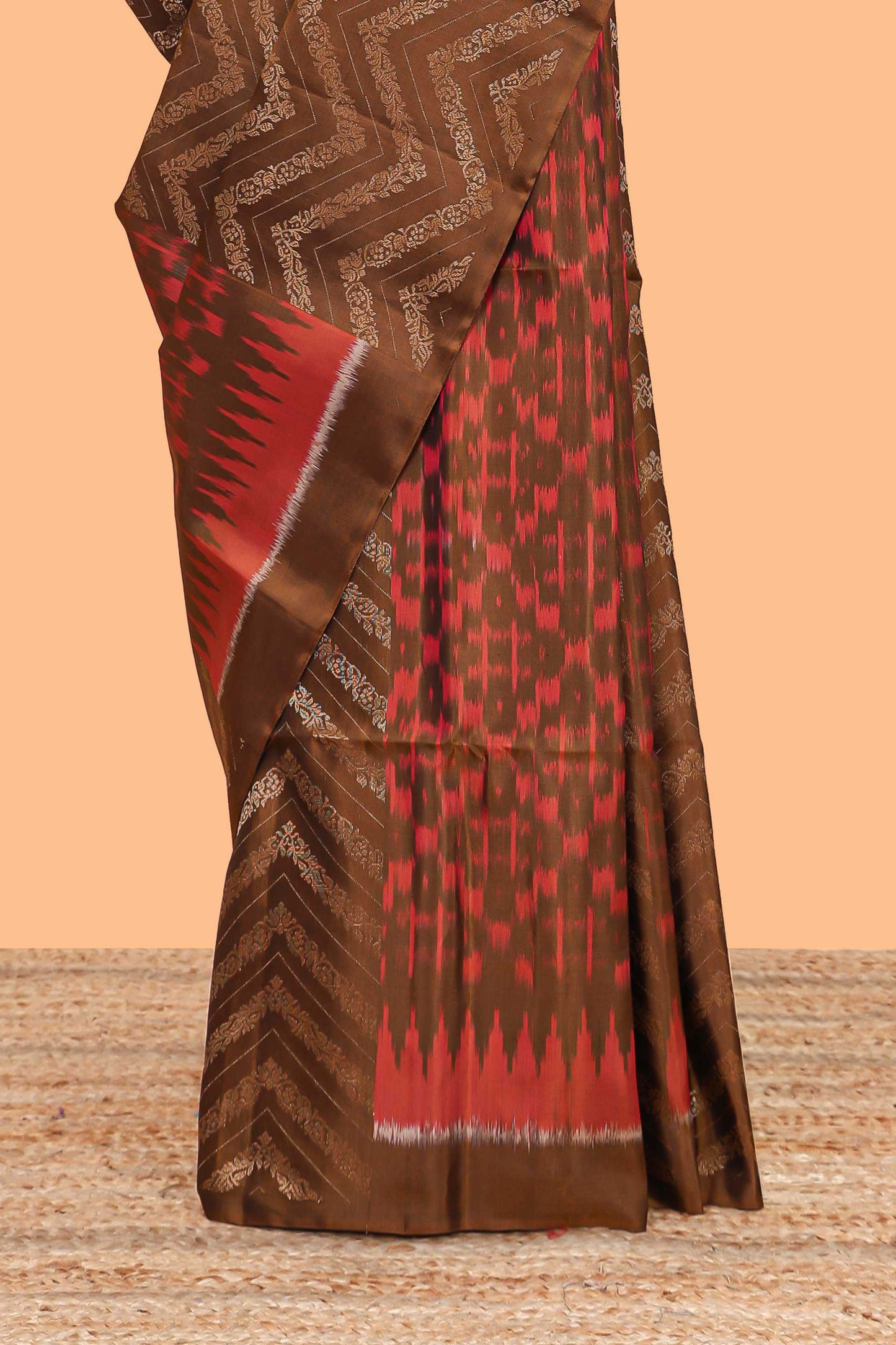 Borderless brown chevron and ikkat style parambariya pattu saree with contrast blouse and pallu
