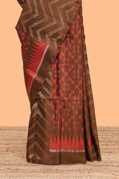 Borderless brown chevron and ikkat style parambariya pattu saree with contrast blouse and pallu