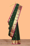 Green floral zari motifs design parambariya pattu saree with contrast border and blouse