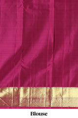 Green floral zari motifs design parambariya pattu saree with contrast border and blouse