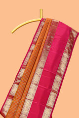 Orange zari checked parambariya pattu saree with contrast bentex border and blouse