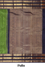 Green zari motifs parambariya pattu saree with contrast zari border and blouse
