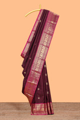 Maroon zari motifs parambariya pattu saree with contrast zari border and blouse