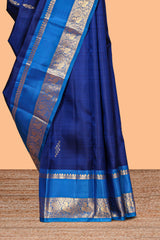 Blue zari motifs parambariya pattu saree with contrast zari border and blouse