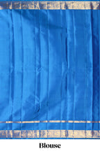 Blue zari motifs parambariya pattu saree with contrast zari border and blouse