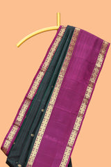 Dark green striped zari motifs parambariya pattu saree with contrast zari border and blouse
