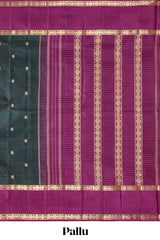 Dark green striped zari motifs parambariya pattu saree with contrast zari border and blouse