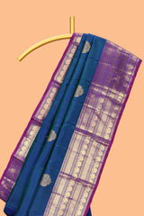 Blue zari motifs parambariya pattu saree with contrast zari border and blouse