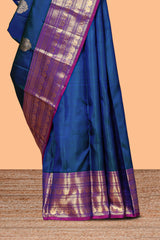 Blue zari motifs parambariya pattu saree with contrast zari border and blouse