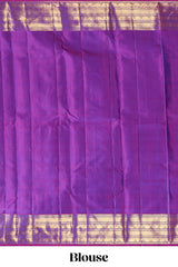 Blue zari motifs parambariya pattu saree with contrast zari border and blouse