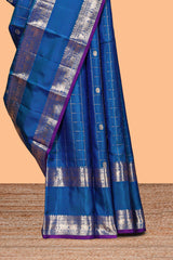 Midnight blue checked zari motifs parambariya pattu saree with self zari border and contrast blouse