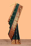 Bottle green floral design zari motifs parambariya pattu saree with contrast zari border and contrast blouse
