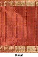 Bottle green floral design zari motifs parambariya pattu saree with contrast zari border and contrast blouse