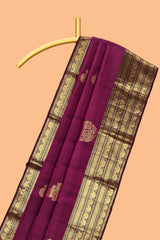 Magenta floral design zari motifs parambariya pattu saree with self zari border and matching blouse