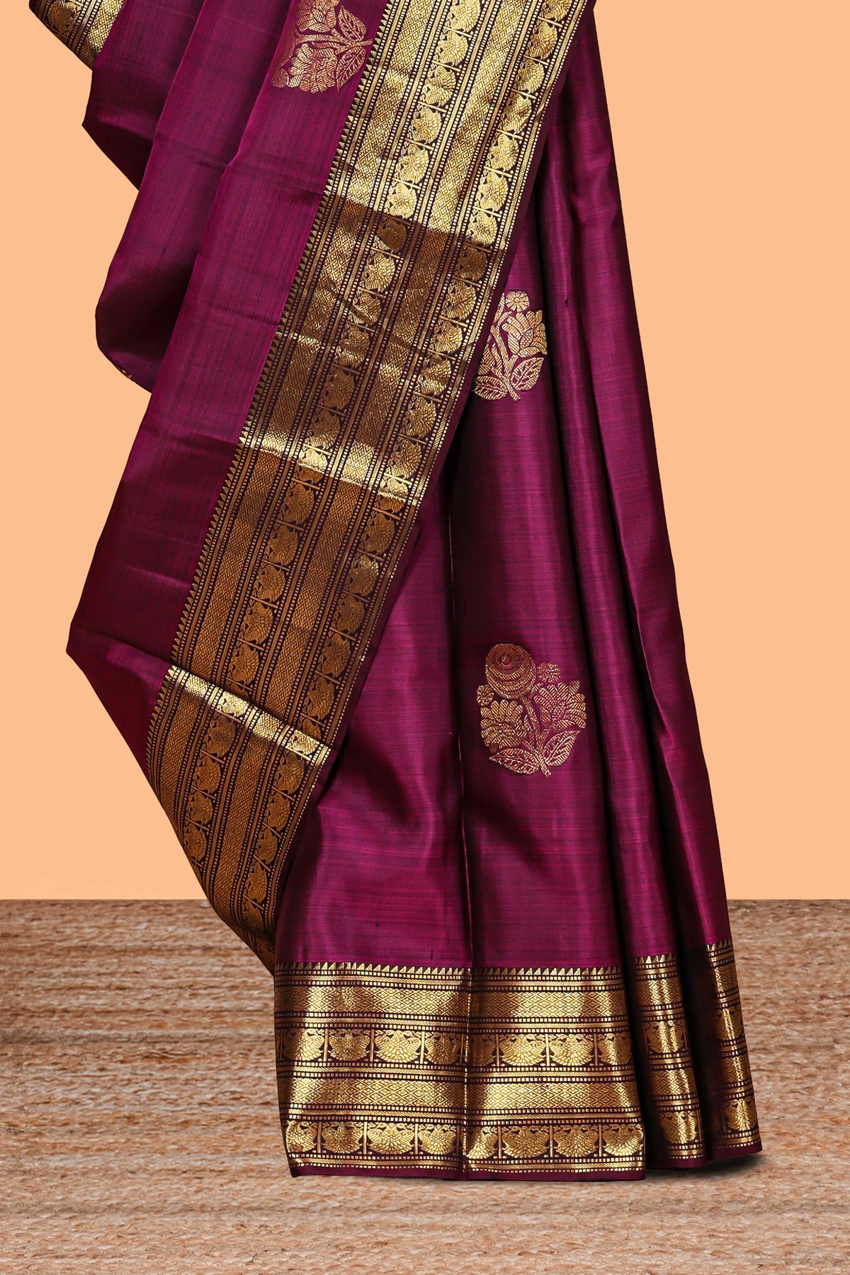 Magenta floral design zari motifs parambariya pattu saree with self zari border and matching blouse