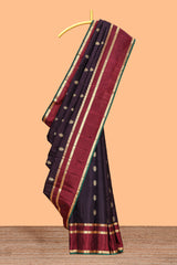 Dark purple zari motifs parambariya pattu saree with contrast zari border and blouse