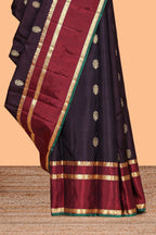 Dark purple zari motifs parambariya pattu saree with contrast zari border and blouse