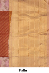 Rust orange geometric design parambariya pattu saree with contrast floral border and motifs blouse