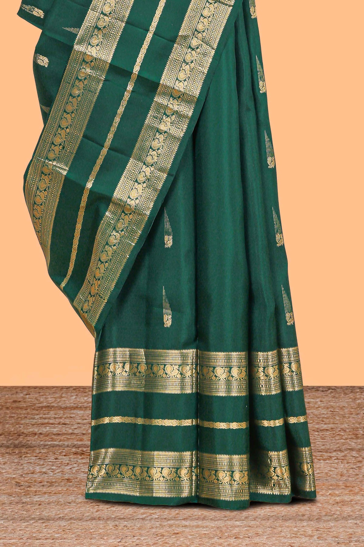 Dark green gold zari butta motifs parambariya pattu saree with self zari border and matching blouse