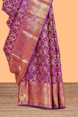 Plum magenta gold floral-vine jaal pattern parambariya pattu saree with self peacock zari border and pallu