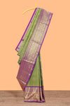 Olive green checked with floral motifs parambariya pattu saree with circular zari medallion border with striped zari designed pallu