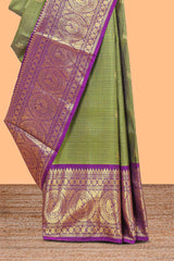 Olive green checked with floral motifs parambariya pattu saree with circular zari medallion border with striped zari designed pallu