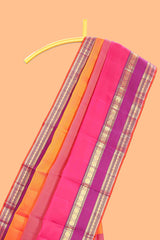 Multicolor plain parambariya pattu saree with contrast purple stripe with zari edging with zari butta pallu with floral blouse