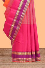 Multicolor plain parambariya pattu saree with contrast purple stripe with zari edging with zari butta pallu with floral blouse