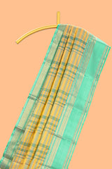 Mustard yellow checked parambariya pattu saree with zari buttas with contrast turquoise green border with zari pallu and plain blouse