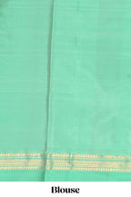Mustard yellow checked parambariya pattu saree with zari buttas with contrast turquoise green border with zari pallu and plain blouse