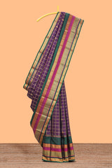 Purple color zari checked parambariya pattu saree with deep green border with zari stripes and contrast checked pallu with blouse