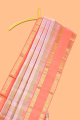 Peach pink with tonal shades checked parambariya pattu saree with contrast border and zari pallu comes with plain blouse