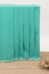 Turquiose green floral motifs maheshwari cotton saree with self zari border and contrast blouse