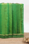 Green plain ikkat cotton saree with self border and zari striped pallu
