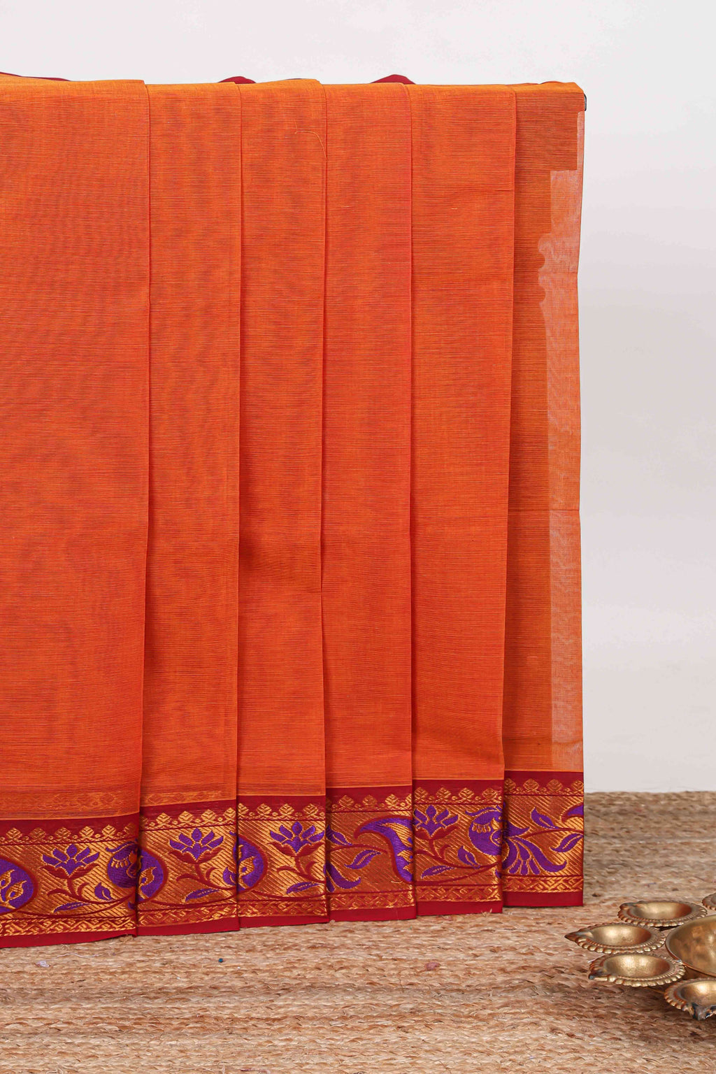 Orange plain venkatagiri cotton saree with contrast zari design border and striped pallu