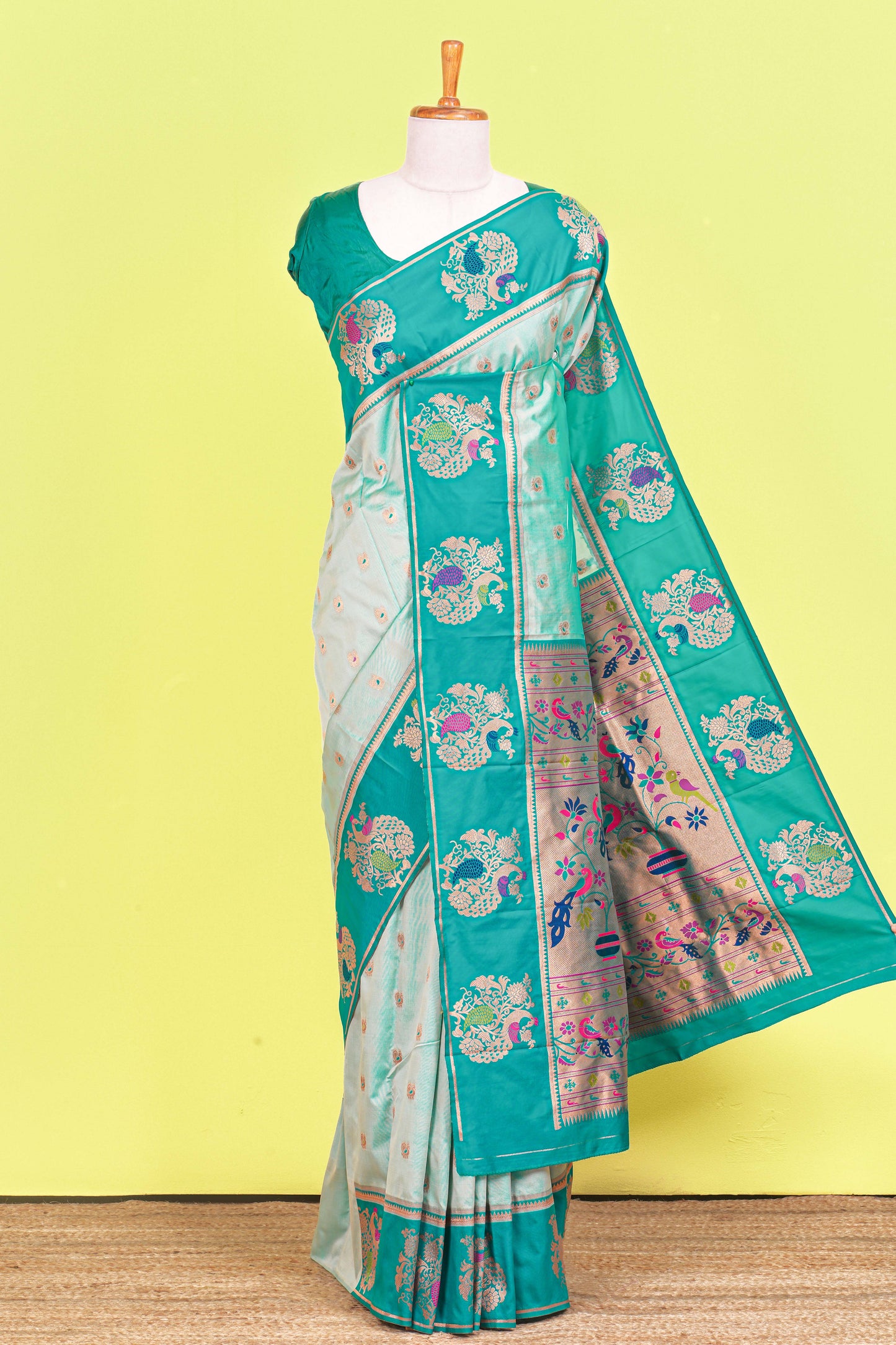 Pastel green art silk mayil butta saree