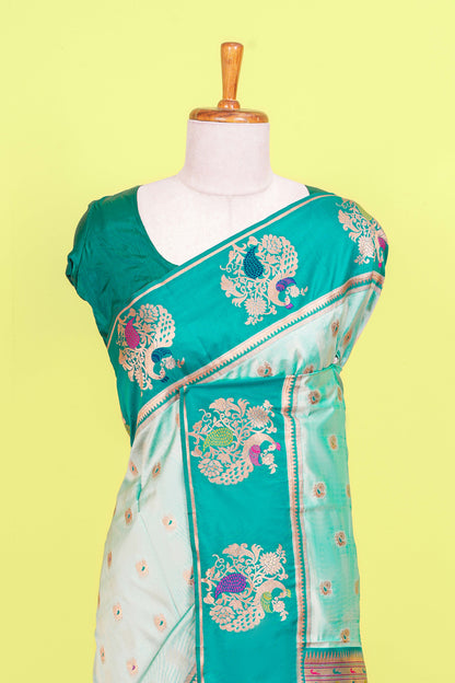 Pastel green art silk woven saree